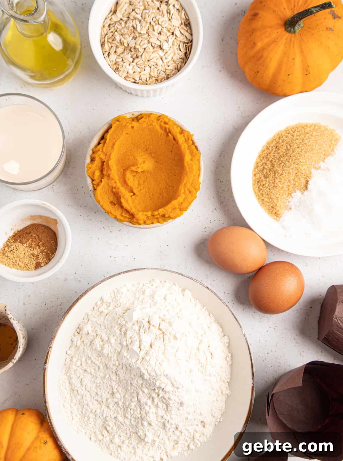 Clockwise from top: oats, sugar and leavening, eggs, flour, spices, sour cream, honey, melted butter 