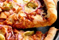 Crispy Cast Iron Skillet Pizza with Cheesy Crust