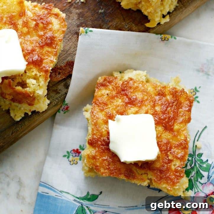 Southern Mexican Cornbread with a cute floral napkin beneath and butter on top