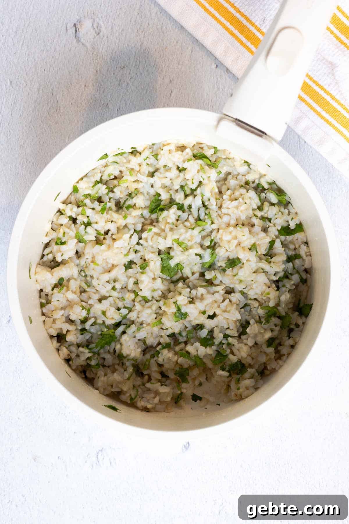 Cilantro lime rice in a small pot.