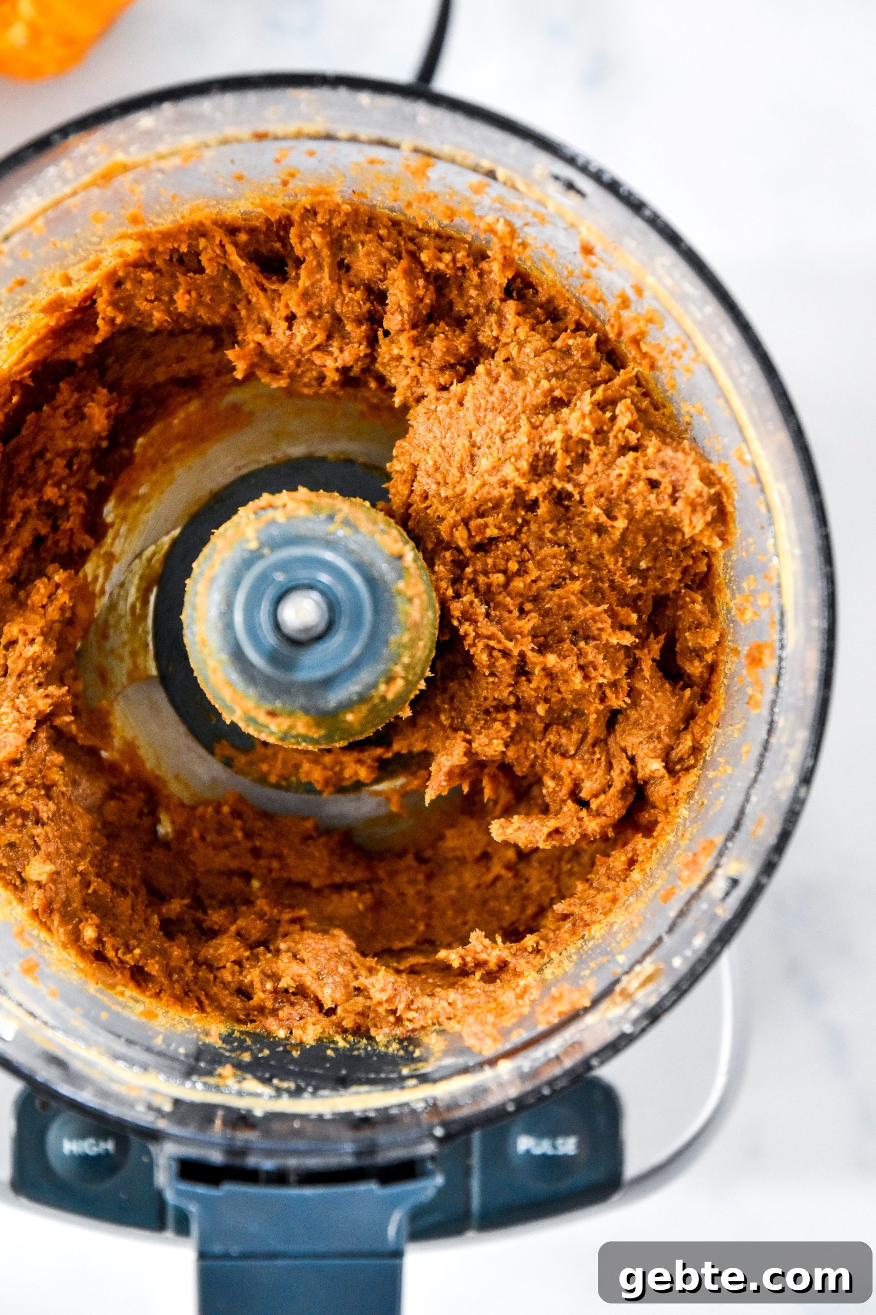 No-Bake Pumpkin Pie Date Balls: Fall Snack Recipe 8 the pumpkin pie date mixture before rolling into balls.
