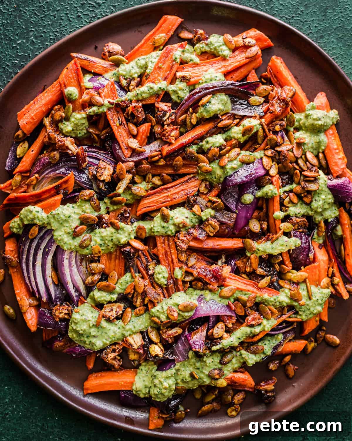 Oven-Roasted Carrots and Dates with Pistachio Pesto 14 Seed sprinkle added on top of dish.