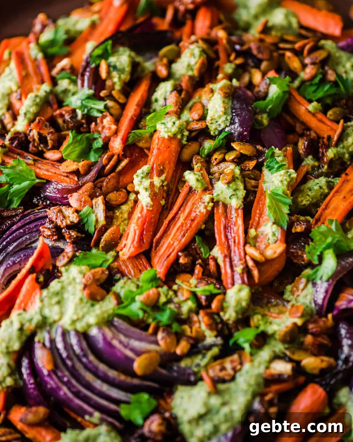 Oven-Roasted Carrots and Dates with Pistachio Pesto 3 Close up photo of finished carrots and dates dish.