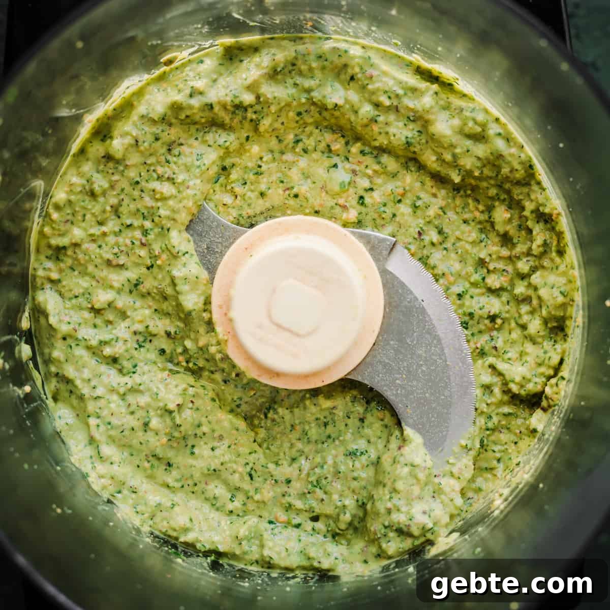 Oven-Roasted Carrots and Dates with Pistachio Pesto 9 Pistachio pesto ingredients in a blender after being blended.