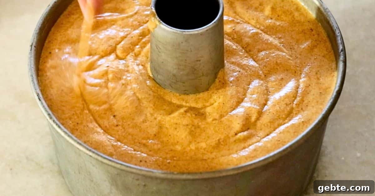 pumpkin chiffon cake batter in a chiffon cake pan
