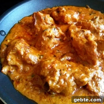 Restaurant-Style Mughlai Chicken Changezi Recipe 4 Image showing shahi chicken changezi in a nonstick pan.