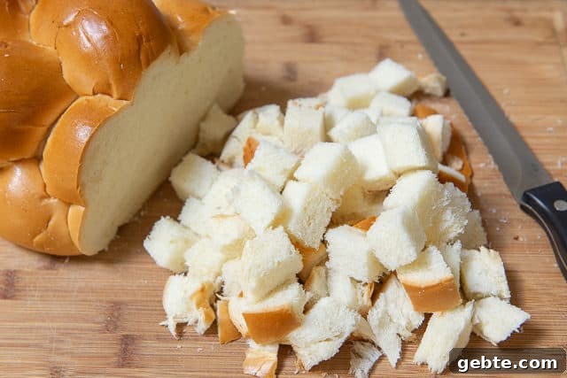 Cubes of Challah Bread on wooden Board