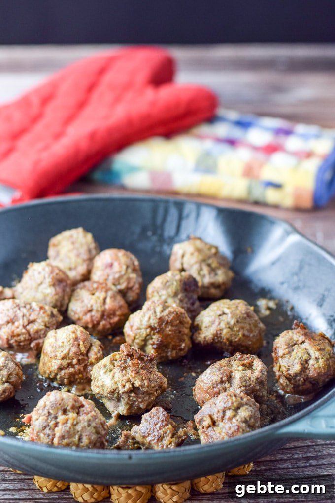 Meatballs sautéed in a cast iron sauté pan