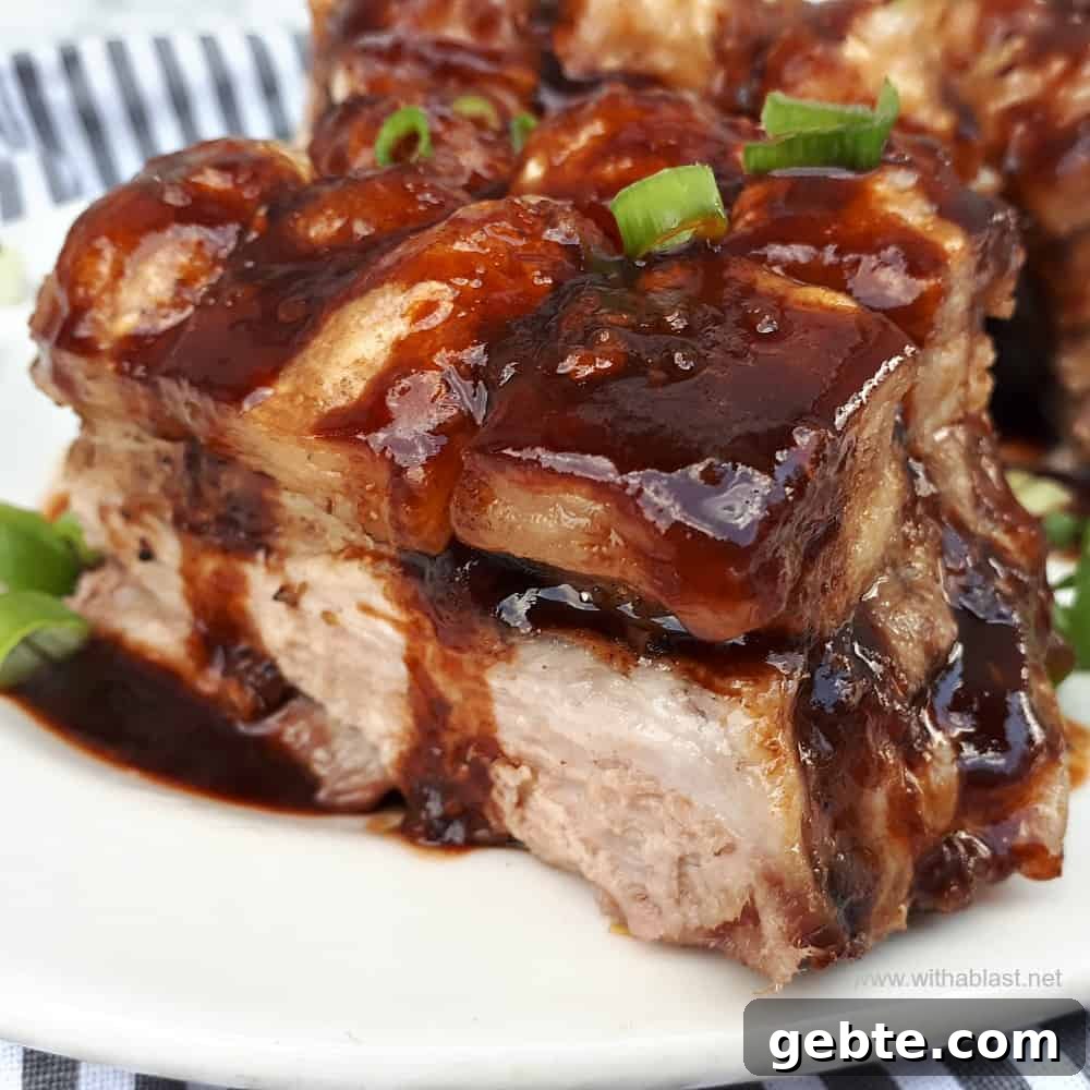 Sticky Pork Belly is an Asian inspired recipe, the meat is super tender and the top is the crispiest (crackling) ever Sticky Pork Belly (Asian Inspired)
