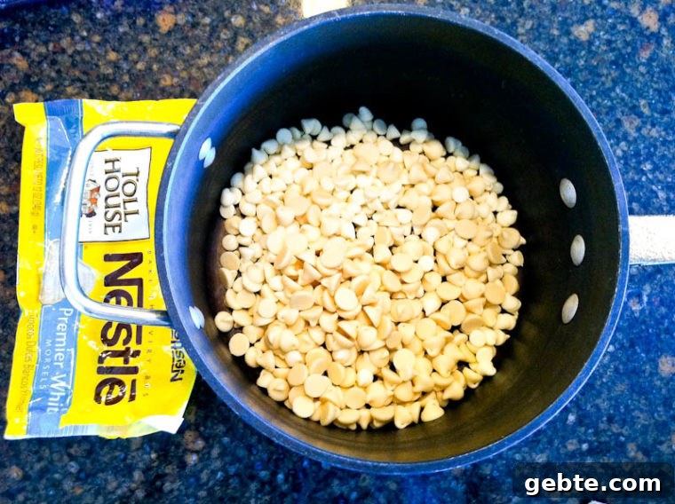 white chocolate chips + can of sweetened condensed milk