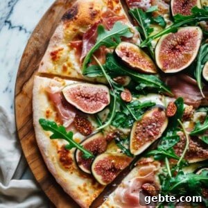 Prosciutto and Arugula Pizza with Balsamic Glaze 5 Arugula and prosciutto pizza on homemade pizza crust.