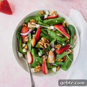 Bowl of strawberry spinach salad.