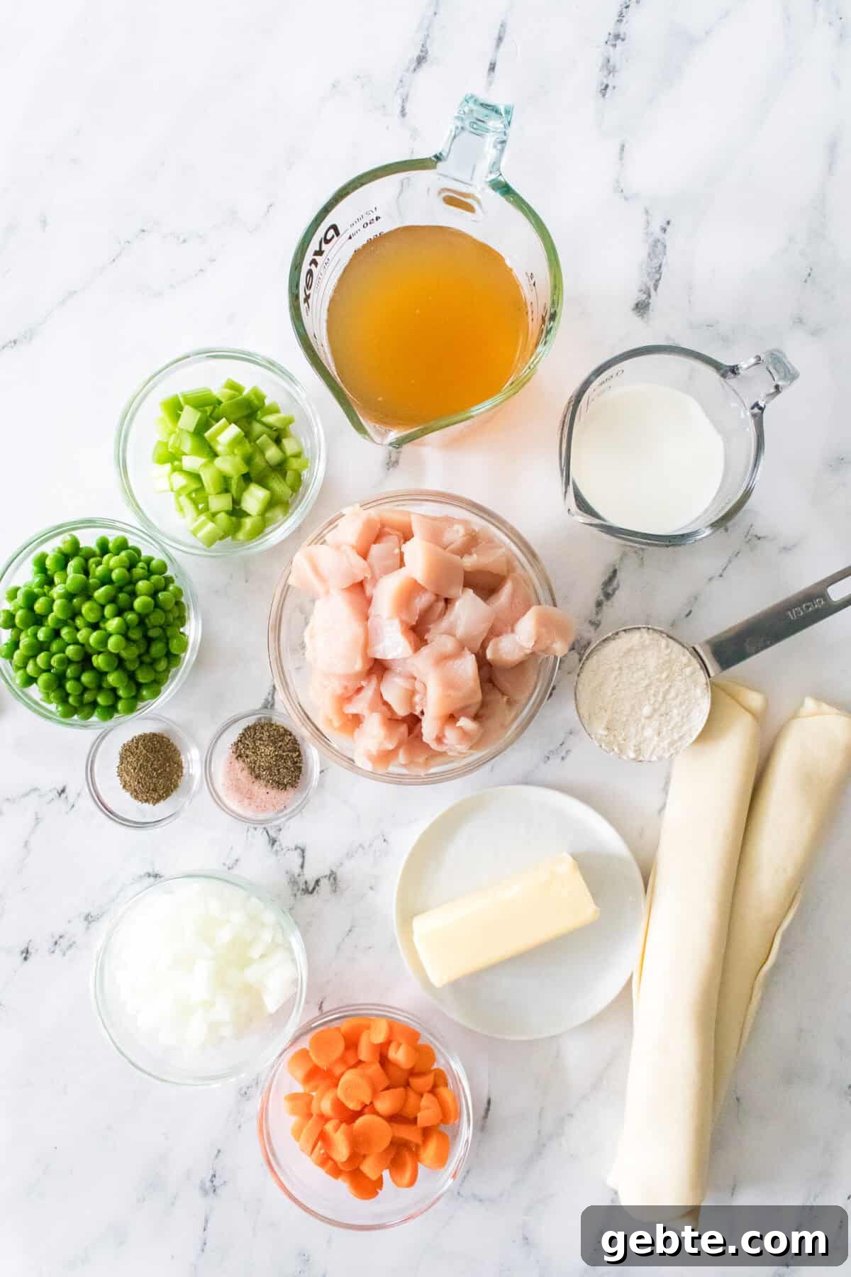 overhead shot of ingredients for chicken pot pie used making pie crust