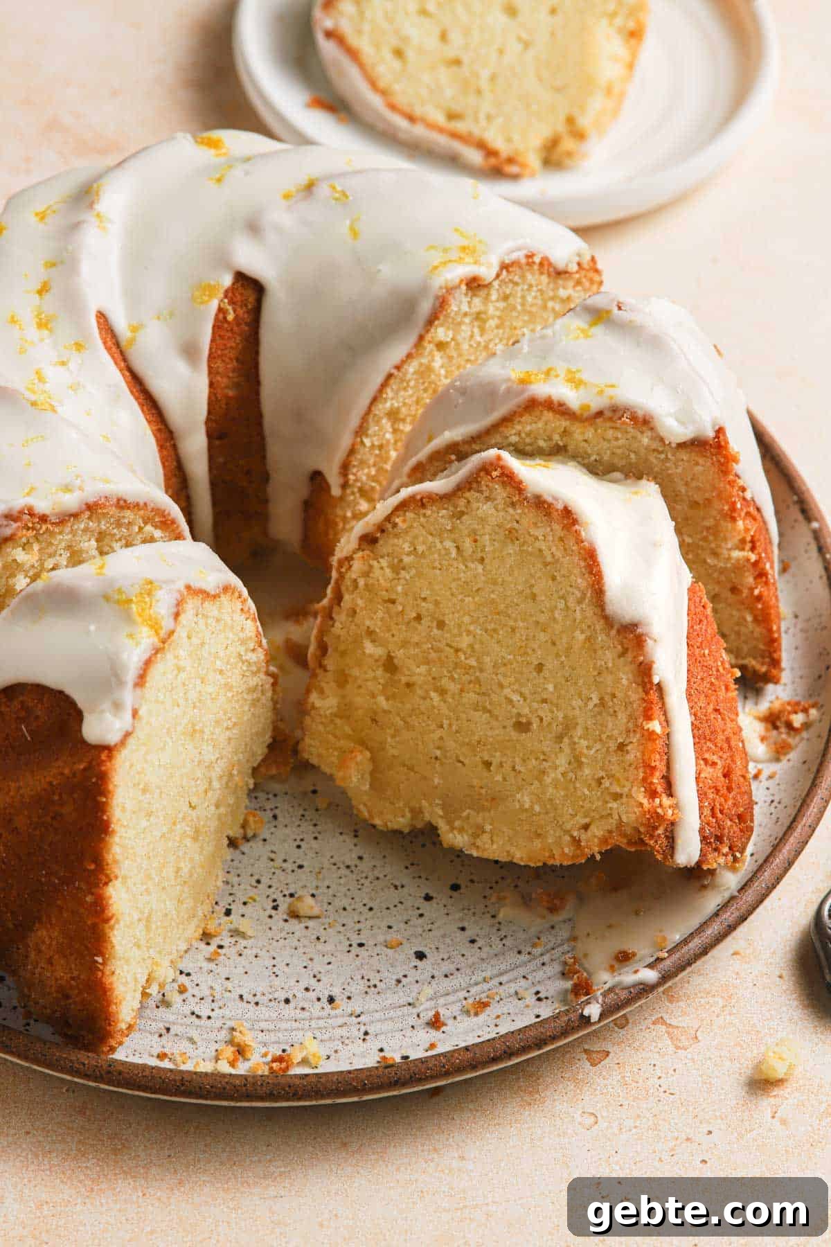 Sliced italian lemon cake with glaze.