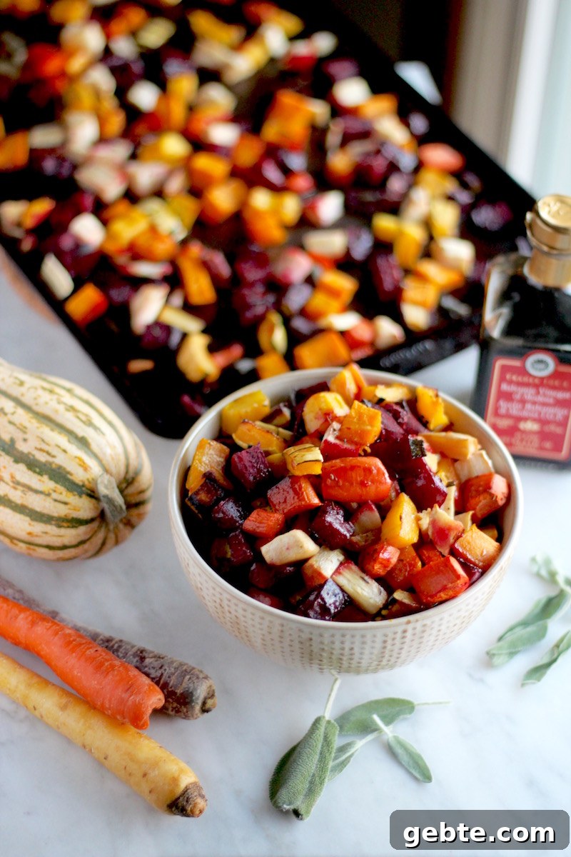 Roasted Rainbow Root Veggies - a colorful, flavorful mingling of roasted vegetables topped with fresh sage and balsamic! | fedandfulfilled.com