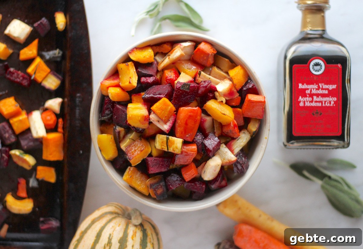 Roasted Rainbow Root Veggies - a simple, paleo side dish bursting with flavor from beets, carrots, parsnips, and squash! | fedandfulfilled.com