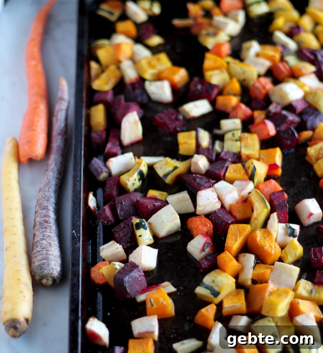 Roasted Rainbow Root Veggies - a Paleo, AIP side dish full of color and flavor thanks to seasonal veggies and squash, fresh sage, and balsamic! | fedandfulfilled.com