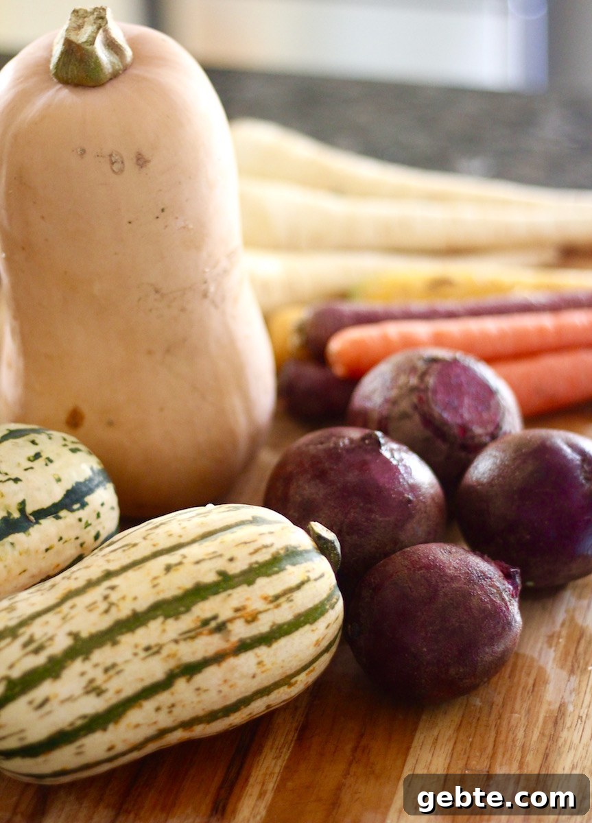 Roasted Rainbow Root Veggies - a delicious, healthy Paleo side dish full of Fall vegetables and squash! | fedandfulfilled.com