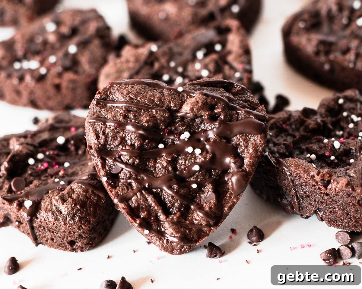 close-up of heart brownies with chocolate drizzle