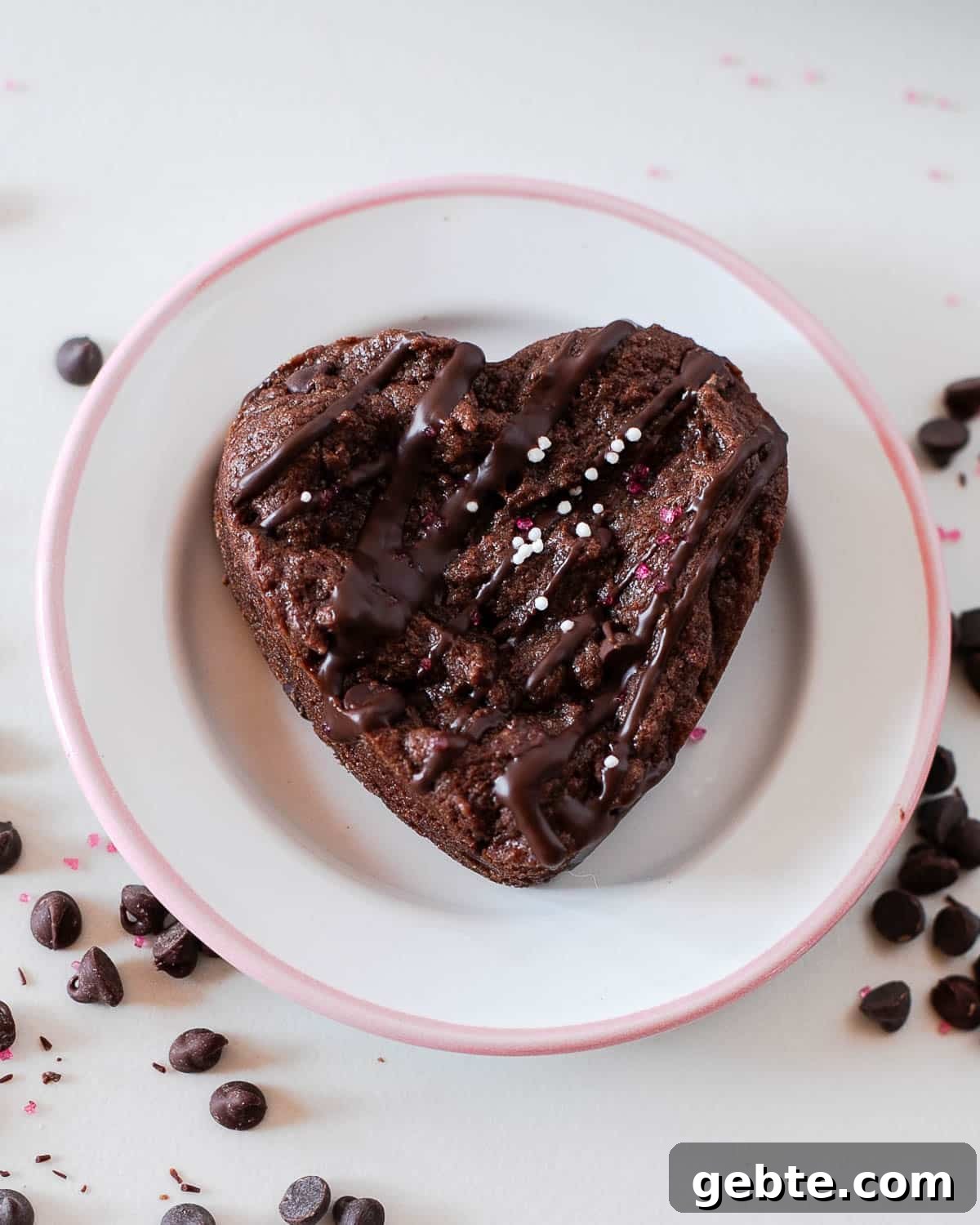 overhead of one of the heart shaped brownies on a plate.