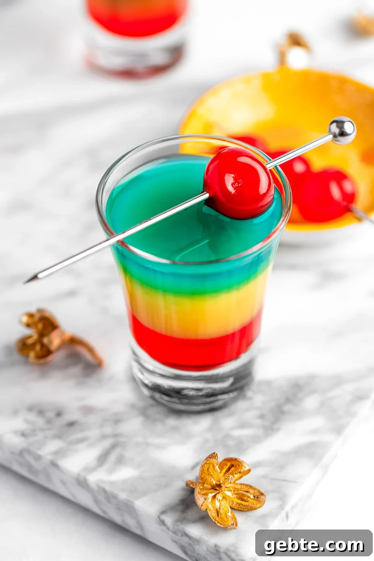 A rainbow shot on a white marble serving board.