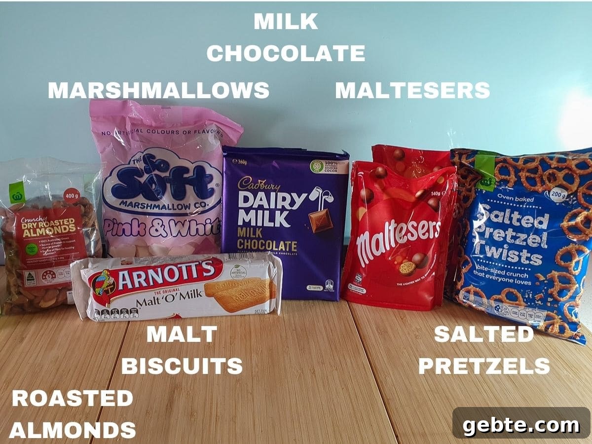 Ingredients: roasted almonds, marshmallows, malt biscuits, milk chocolate, Maltesers, salted pretzels.